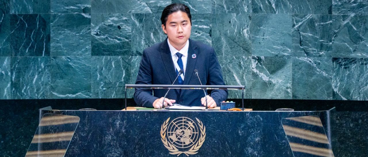 Jaewon Choi delivering remarks at the podium of the UN General Assembly Hall during the 2026 High-Level Political Forum