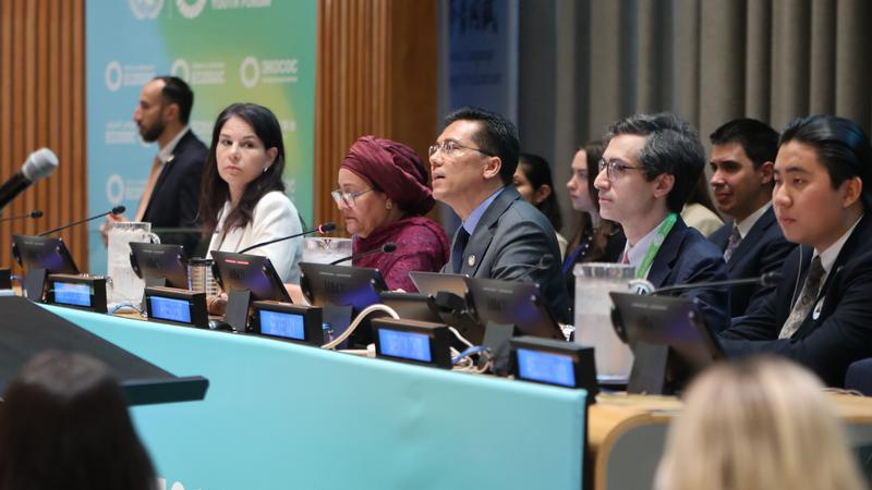 On the dais at the ECOSOC Youth Forum