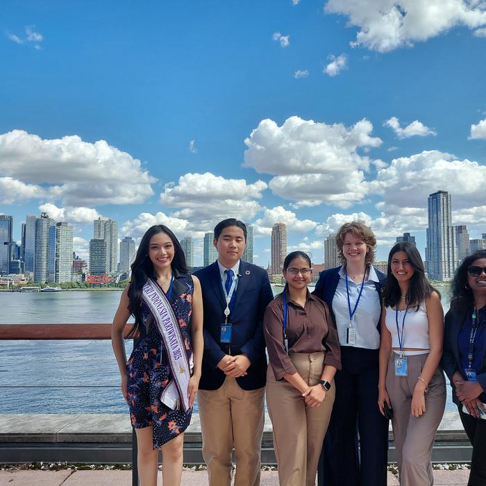 With colleagues overlooking the East River at UN Headquarters